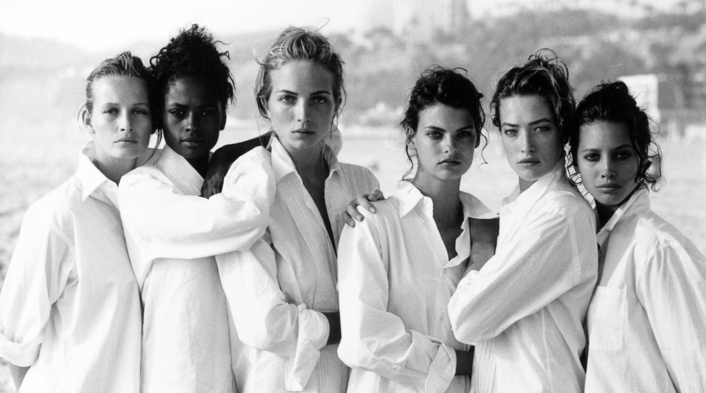 Estelle Lefébure, Karen Alexander, Rachel Williams, Linda Evangelista, Tatjana Patitz & Christy Turlington, Santa Monica, California, 1988. © Peter Lindbergh. Courtesy Peter Lindbergh Foundation, Paris
